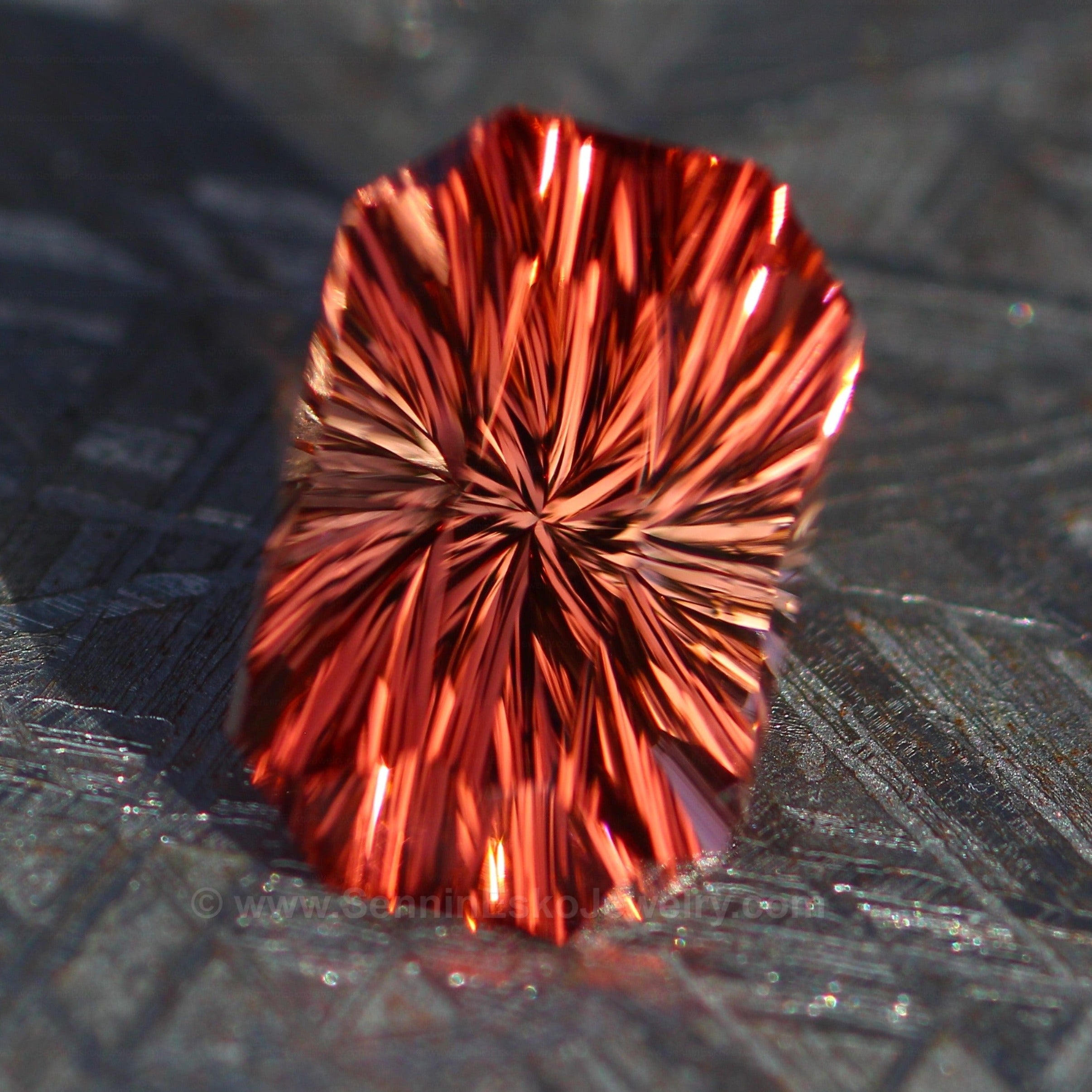 Triplite, orange-red faceted, Pakistan. 0.77 carat.