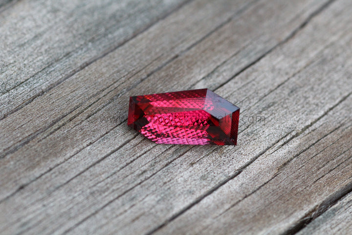 10.8 Carat Umbalite Garnet - Fantasy Cut Sennin Esko Jewelry Almandine, Archive Tag, Fantasy Cut, Fantasy Cut Garnet, fish, Garnet, Gems & Cabochons, Gemstones,  Past Hand Cut Gemstones