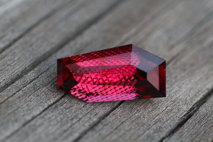 10.8 Carat Umbalite Garnet - Fantasy Cut Sennin Esko Jewelry Almandine, Archive Tag, Fantasy Cut, Fantasy Cut Garnet, fish, Garnet, Gems & Cabochons, Gemstones,  Past Hand Cut Gemstones