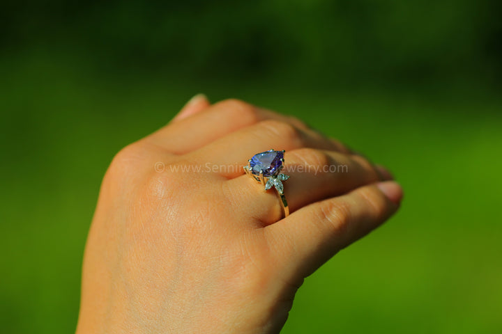 18kt Gold Multi Prong Setting with Large Diamond Marquise Accents - Depicted with a 3.9 Carat Tanzanite Tear Drop (Setting Only, Center Stone Sold Separately)