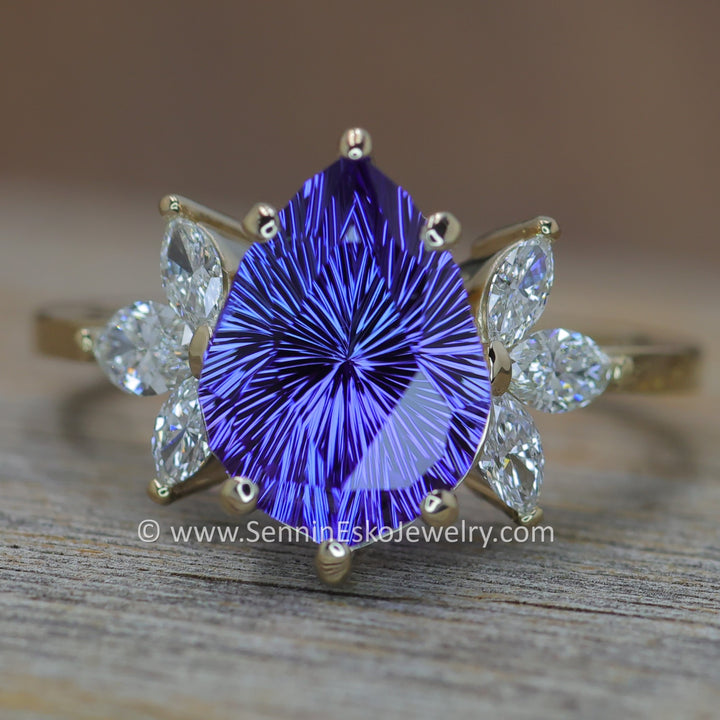 18kt Gold Multi Prong Setting with Large Diamond Marquise Accents - Depicted with a 3.9 Carat Tanzanite Tear Drop (Setting Only, Center Stone Sold Separately)