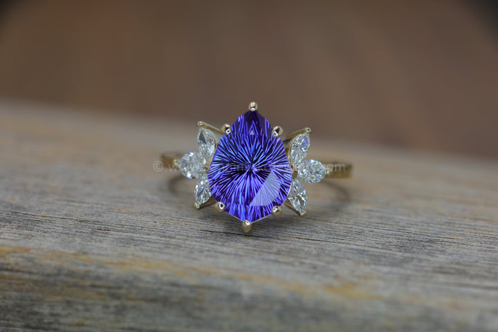 18kt Gold Multi Prong Setting with Large Diamond Marquise Accents - Depicted with a 3.9 Carat Tanzanite Tear Drop (Setting Only, Center Stone Sold Separately)