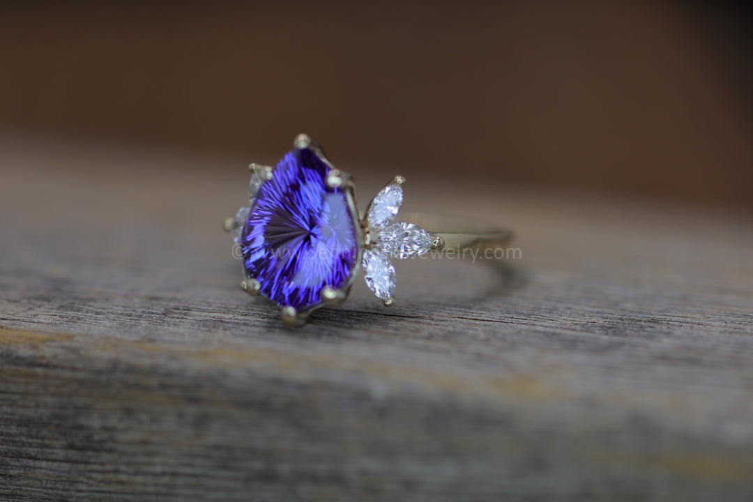 18kt Gold Multi Prong Setting with Large Diamond Marquise Accents - Depicted with a 3.9 Carat Tanzanite Tear Drop (Setting Only, Center Stone Sold Separately)