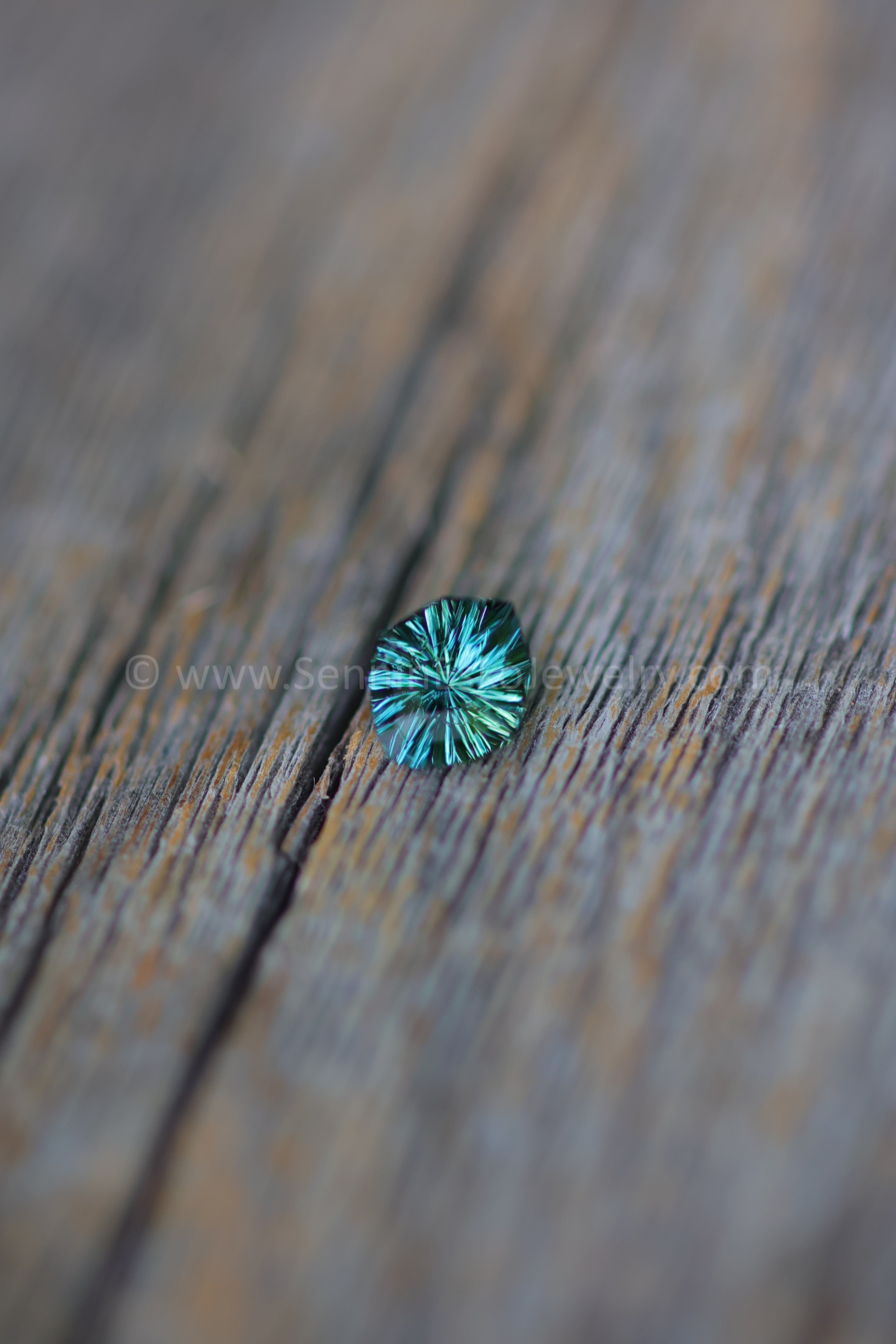 1.5 Carat Blue/Green Sapphire Shield - 7.7x6.7mm - Galaxy Cut