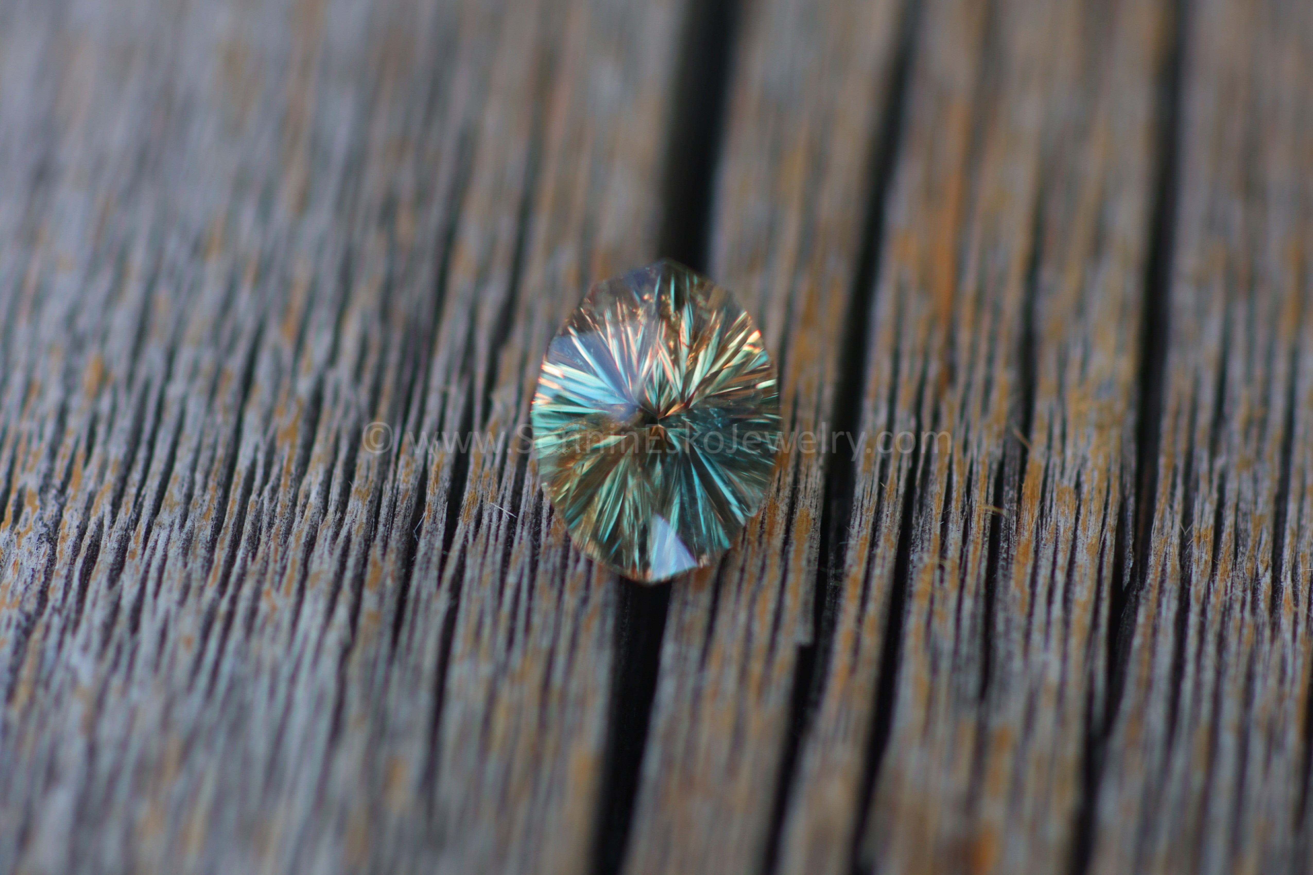 1.8 Carat Color Changing Orange Sapphire Oval Galaxy Cut - 8.9x6