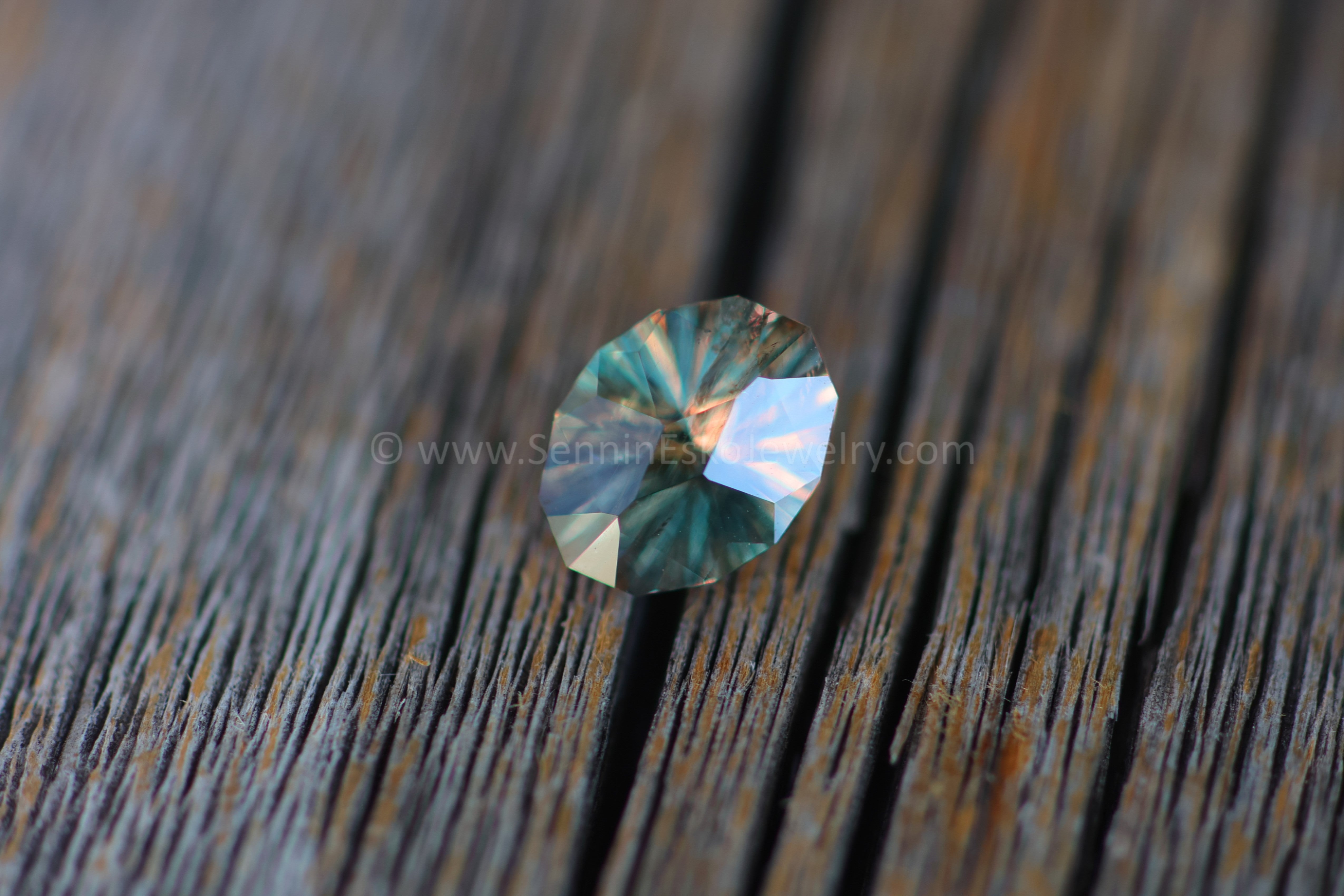 1.8 Carat Color Changing Orange Sapphire Oval Galaxy Cut - 8.9x6