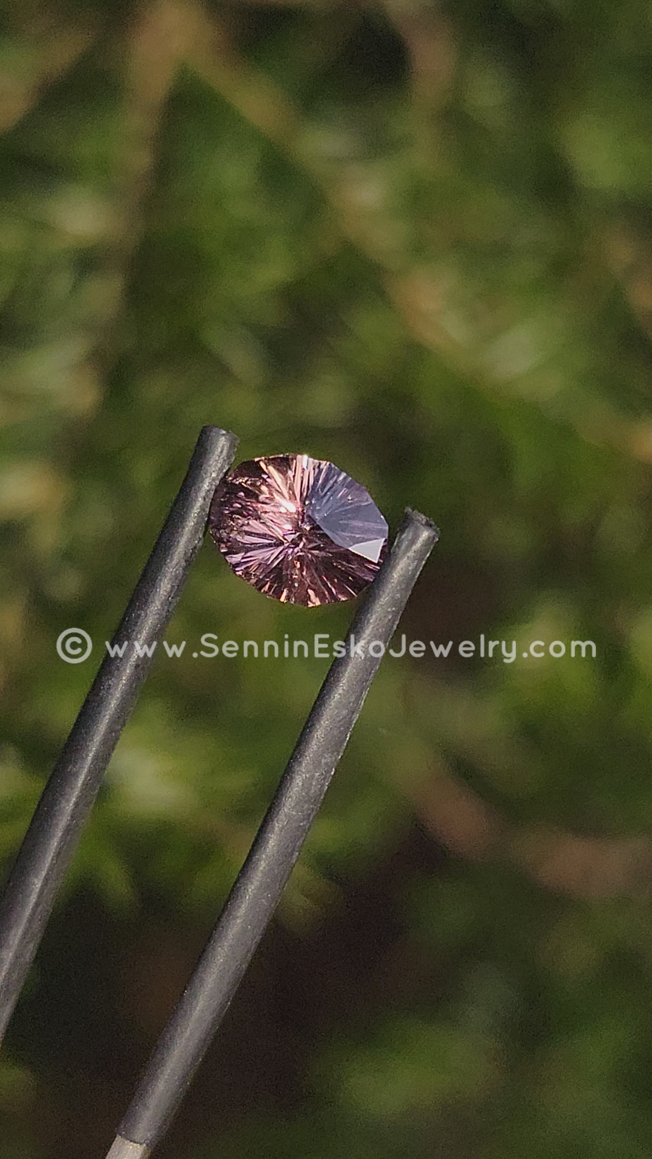 1.8 Carat Color Changing Orange Sapphire Oval Galaxy Cut - 8.9x6