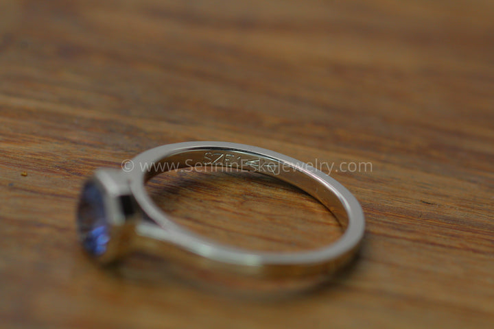 Peekaboo Medium/Lightweight Ring Setting - Depicted with Periwinkle Umba Sapphire (Setting Only, Center Stone Sold Separately) Sennin Esko Jewelry Bezel Engagement, Blue Sapphire, color changing sapphire, Customizable Setting, Dainty Band, Engagem Loose Settings