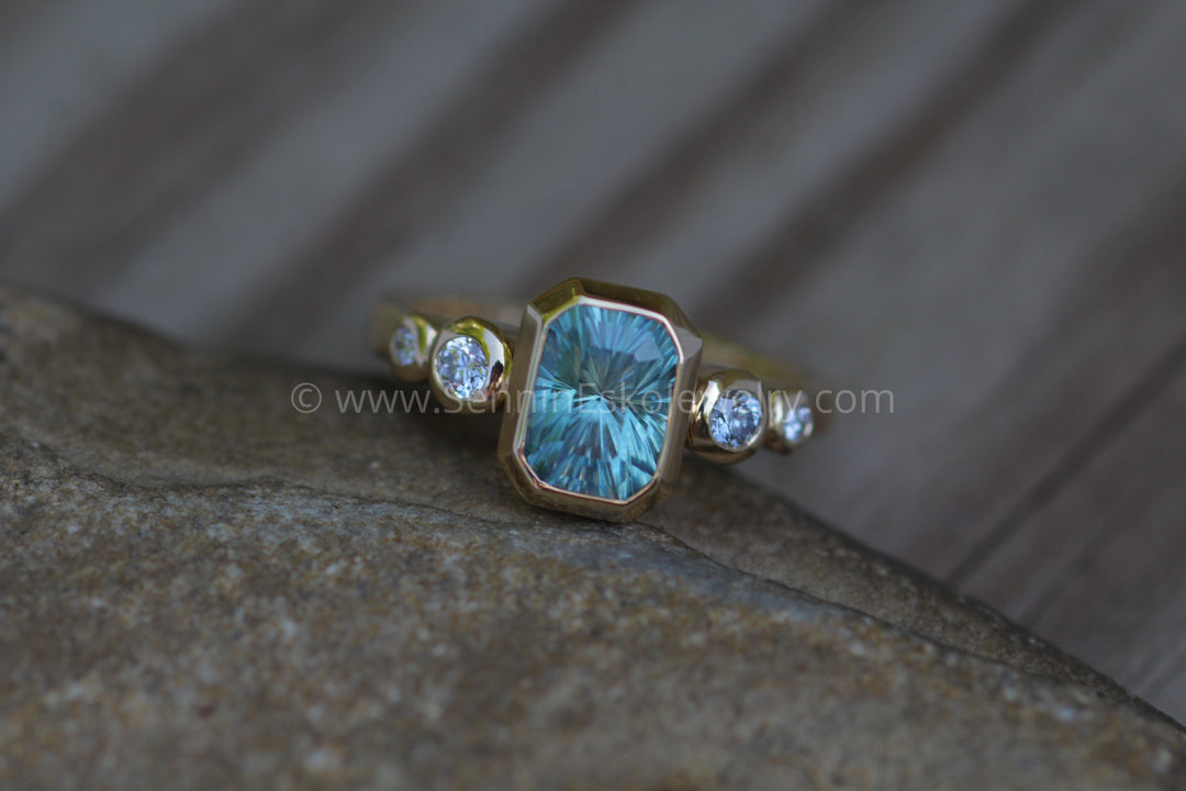 Five Stone Diamond Accented Multi Bezel Setting - Depicted with a Fantasy cut Montana Sapphire Octagon (Setting Only, Center Stone Sold Separately) Sennin Esko Jewelry Emerald Cut Ring, Engagement Rings, Ethical Aquamarine, Gold Engagement Ring, Jewelry, Montana Sapph Loose Settings