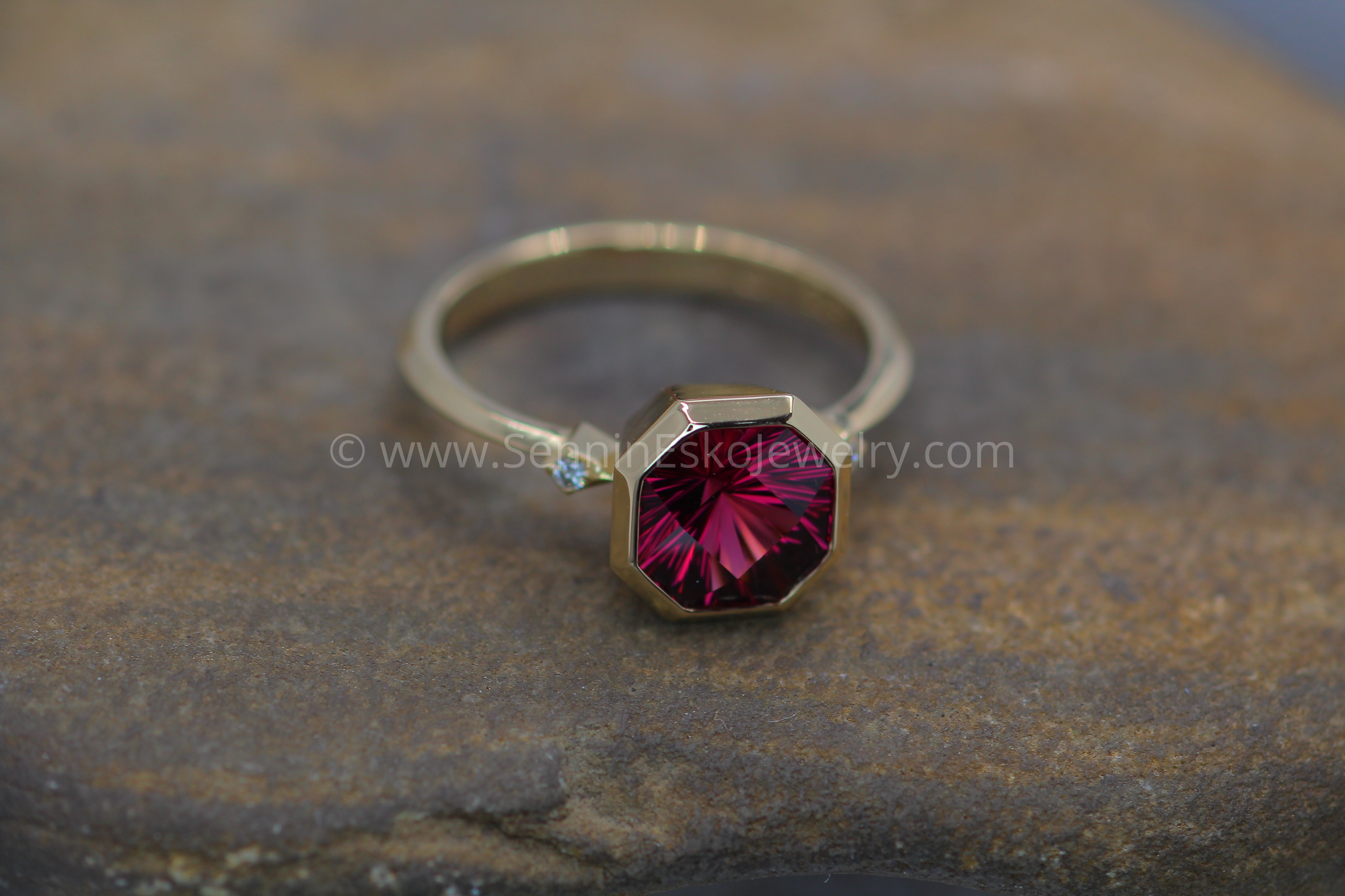 Bezel set garnet on sale ring