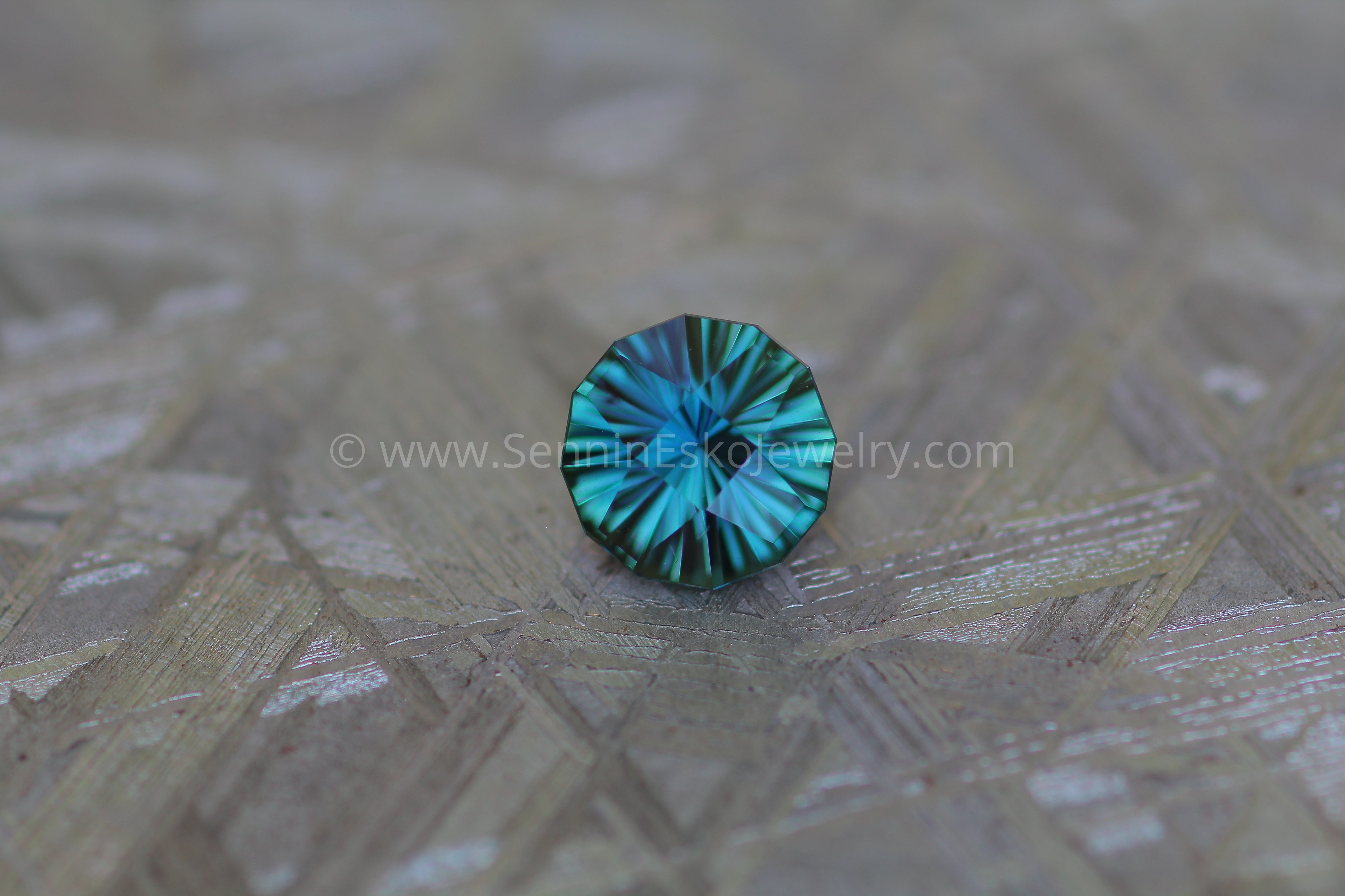 1.68 carat Blue/Green Sapphire Round - Fantasy Cut, 7mm in