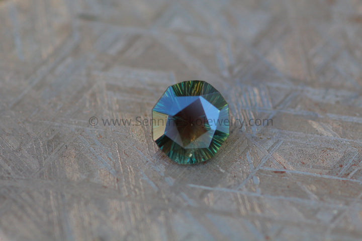 2.8 carat Greenish Brown Sapphire - Fantasy Cut, 9.2x8.6mm Sennin Esko Jewelry Archive Tag, Beads, Cushion Sapphire, Electric Sapphire, Fantasy Cut, Fantasy Cut Sapphire, Gems & C Past Hand Cut Gemstones