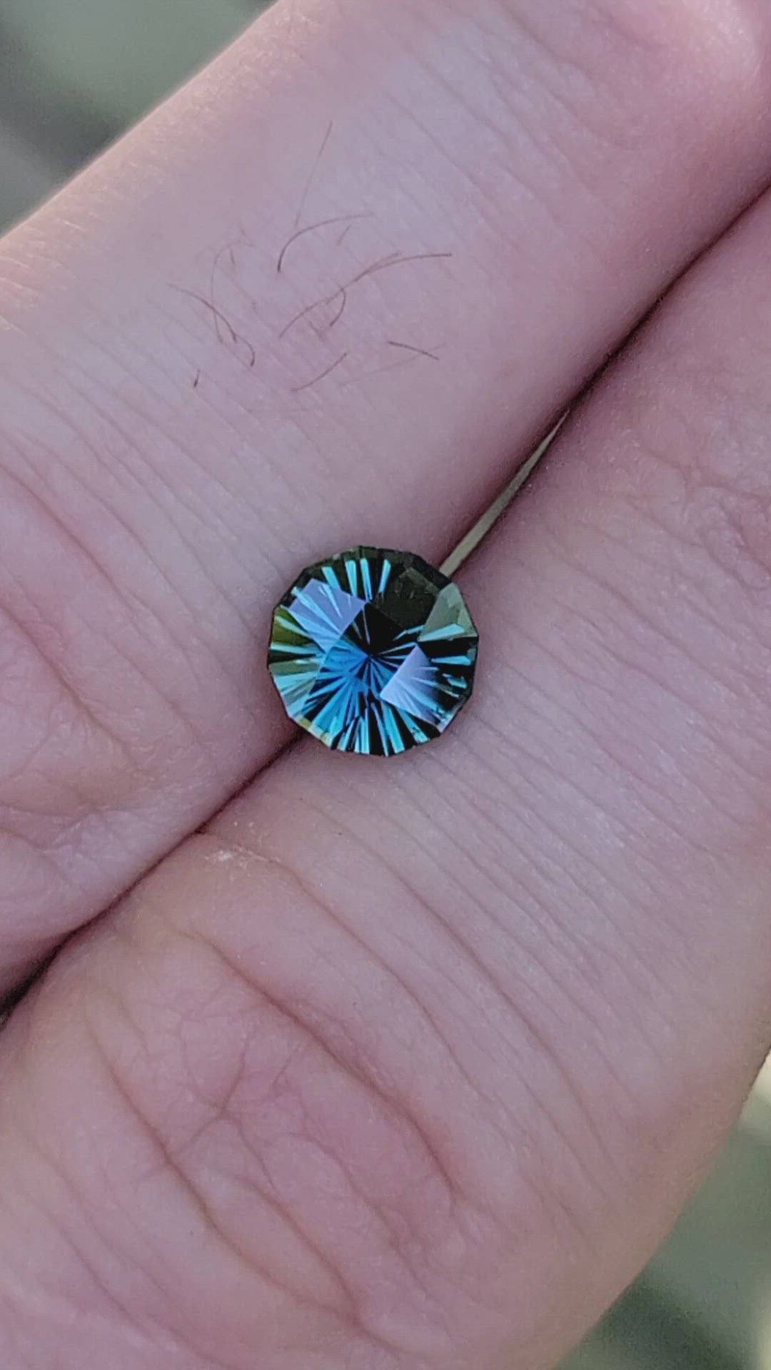 1.68 carat Blue/Green Sapphire Round - Fantasy Cut, 7mm in diameter