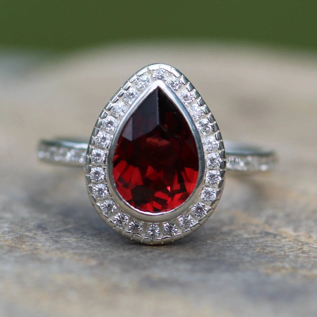 Pear shaped store garnet engagement ring