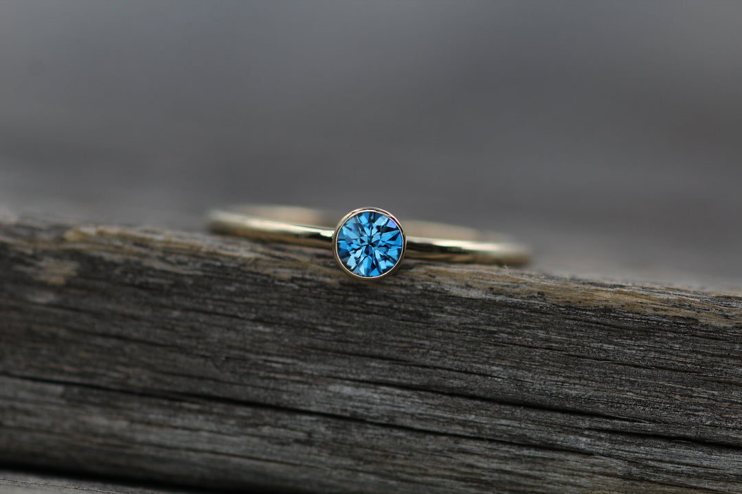 London Blue Topaz Yellow Gold Stacking Ring - Precision Cut London Blue Topaz Ring - Topaz Bezel Ring Sennin Esko Jewelry Alternative Ring, Bezel Stacking Ring, Dark Blue Topaz, Electric Blue Topaz, London Blue, London Blu FINE RINGS / ENGAGEMENT