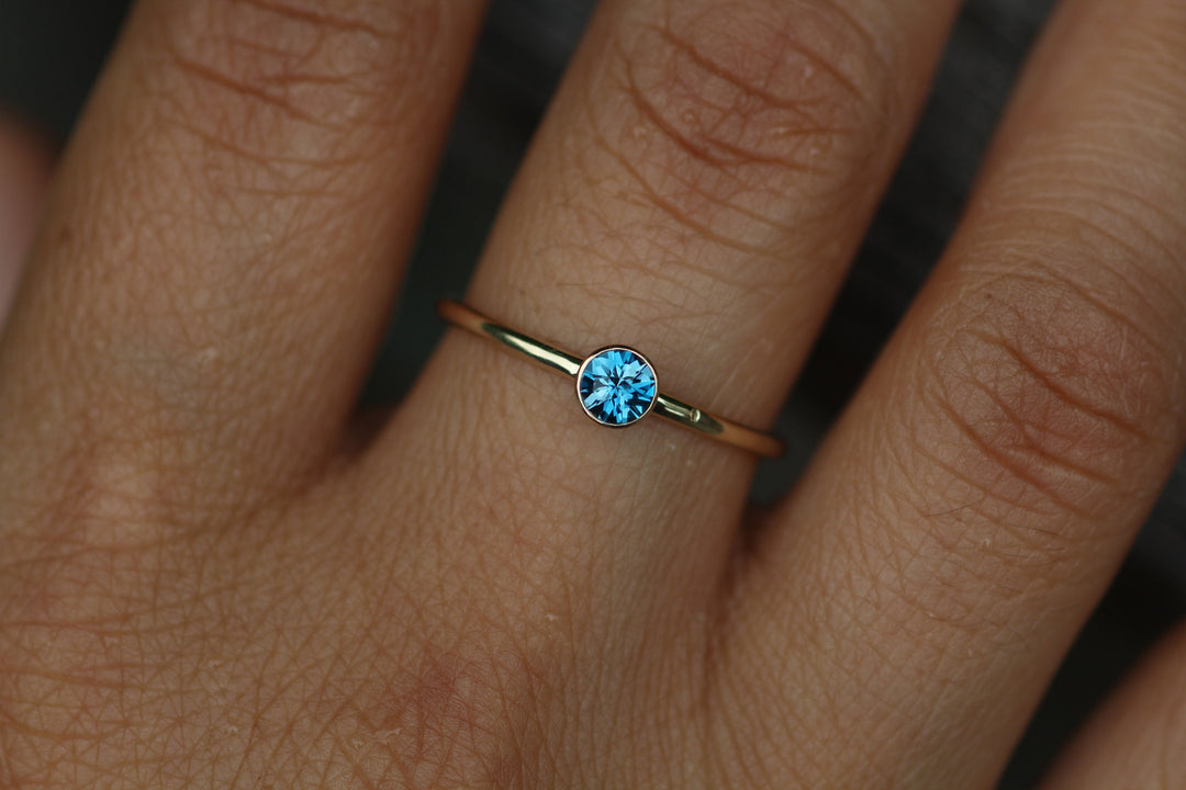 London Blue Topaz Yellow Gold Stacking Ring - Precision Cut London Blue Topaz Ring - Topaz Bezel Ring Sennin Esko Jewelry Alternative Ring, Bezel Stacking Ring, Dark Blue Topaz, Electric Blue Topaz, London Blue, London Blu FINE RINGS / ENGAGEMENT